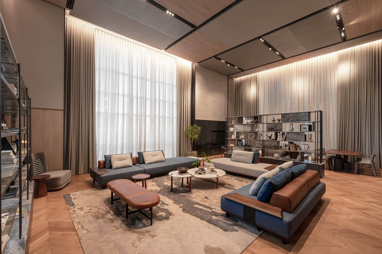 Large-format living and dining space inside a TRX Residences show unit
